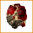 A centered and reduced-size render of red and yellow crystals atop a rock, most suitable for use as an item sprite