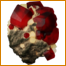 A centered and reduced-size render of red and yellow crystals atop a rock, more suitable for use as an item sprite